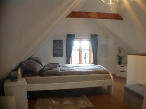 Cama o camas de una habitación en Ferienhaus Sprotte