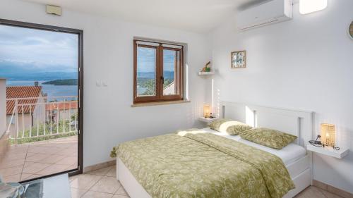 Posteľ alebo postele v izbe v ubytovaní Apartment Karabaic by El-Pi Tours