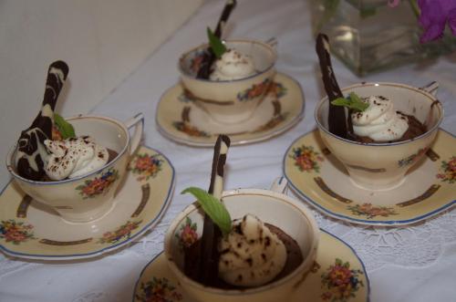 a table topped with four cups of ice creaminis at Lemoenkloof Boutique Hotel in Paarl