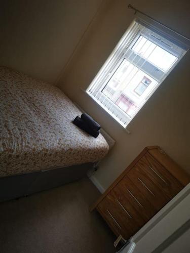 Katil atau katil-katil dalam bilik di Darlington central 3 bed home