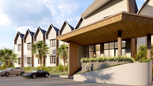 a rendering of a building with cars parked in front at Freddies Santai Sumurtiga in Sabong