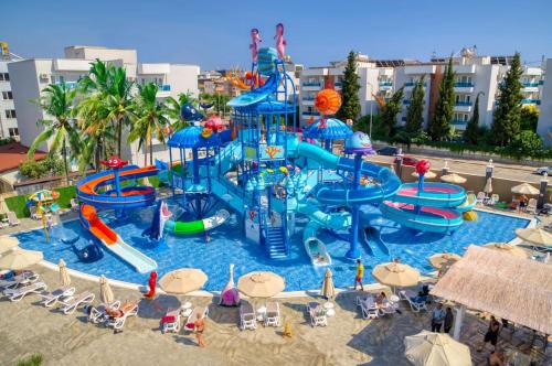 a large water park with a water slide at Blue Wave Suite Hotel in Alanya