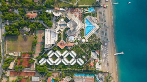 an overhead view of a city with buildings and water at Adora Hotel & Resort in Belek