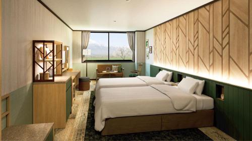 ein Schlafzimmer mit einem großen weißen Bett in einem Zimmer in der Unterkunft Hachimantai Mountain Hotel & Spa in Hachimantai