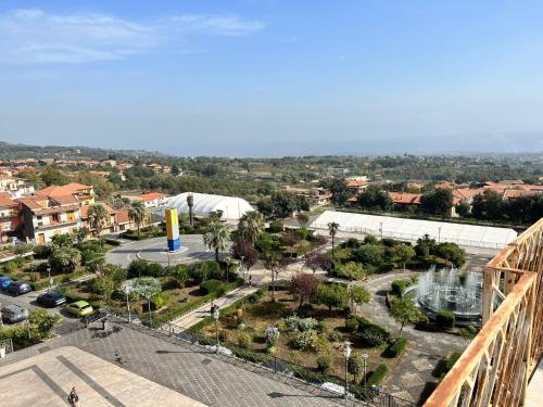 a view of the city from the top of a building at Casa vacanze al castello in Zafferana Etnea