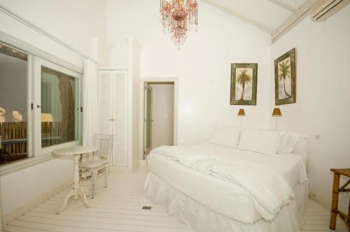 Ένα ή περισσότερα κρεβάτια σε δωμάτιο στο Felissimo Exclusive Hotel
