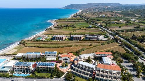 an aerial view of a resort next to the ocean at Hydramis Palace Beach Resort in Georgioupolis