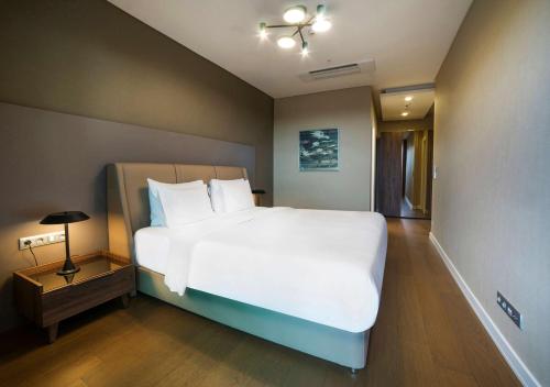 Cama o camas de una habitación en Radisson Residences Vadistanbul