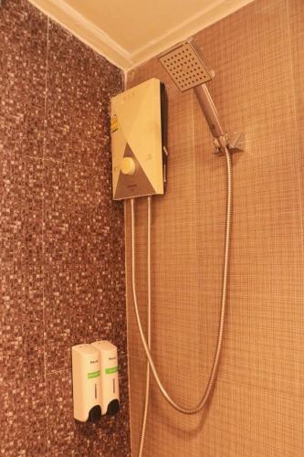 a shower in the corner of a bathroom at Malibu Samed Resort in Ko Samed