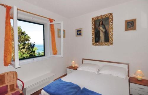 A bed or beds in a room at Villa Tatjana