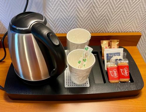 a coffee maker on a tray on a table at Hotel all'Orso in Biancade