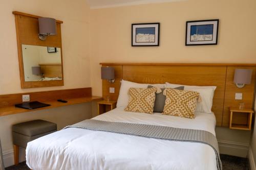 Letto o letti in una camera di Castle Court
