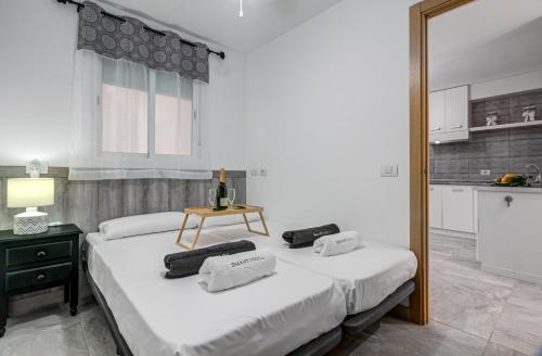 Ένα ή περισσότερα κρεβάτια σε δωμάτιο στο Casa Yasday I