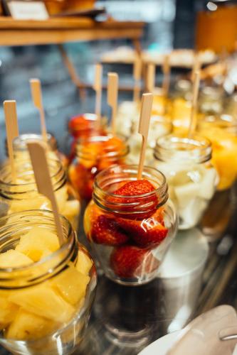 a group of jars of fruit on a counter at Hotel Spa Republica in Mar del Plata