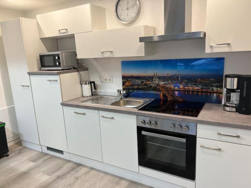 Kuchyň nebo kuchyňský kout v ubytování Wohnung im schönen Bielstein