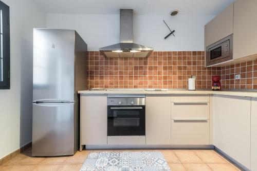 Η κουζίνα ή μικρή κουζίνα στο Residencial Las Candelarias 36