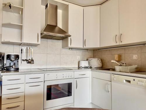 Kuchyň nebo kuchyňský kout v ubytování Appartement Nour