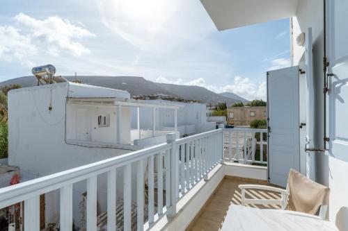 a balcony with a view of the mountains at Livadia Studio A Paros in Parikia