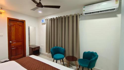 Katil atau katil-katil dalam bilik di D2Stay Homestay 2Bhk Near Paltan Bazar