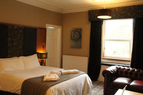 Katil atau katil-katil dalam bilik di Glazert Country House Hotel