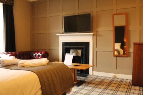 Katil atau katil-katil dalam bilik di Glazert Country House Hotel