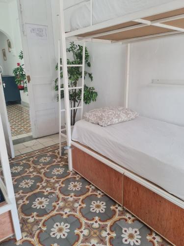 Postel nebo postele na pokoji v ubytování Hostel On