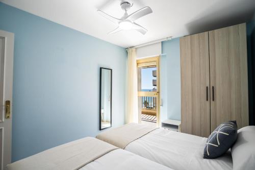En eller flere senger på et rom på Sur Suites Sofia