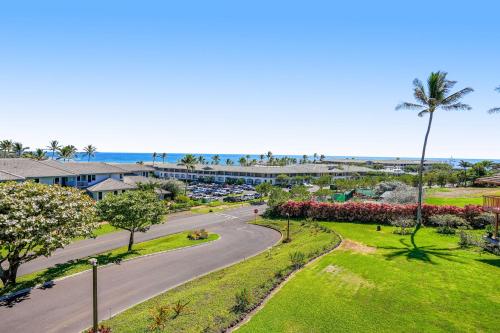 an aerial view of a road in front of a resort at Makanui at Poipu Resort 222 in Koloa