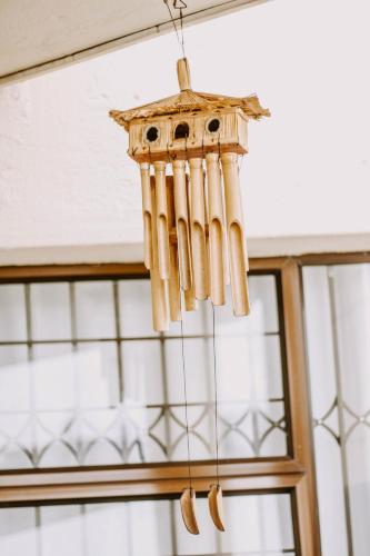 a light fixture hanging from a ceiling at La Dolce Vita Umhlanga Guesthouse in Durban