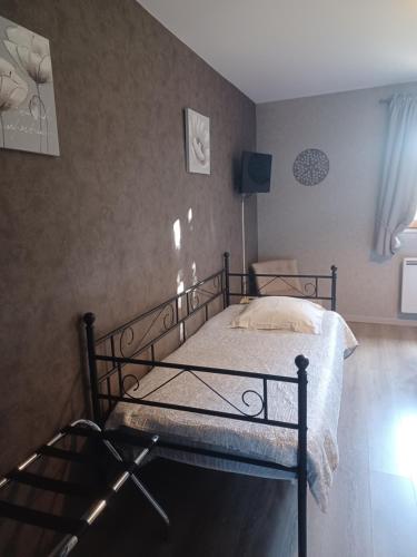 Postel nebo postele na pokoji v ubytování Chez Michel et Michele