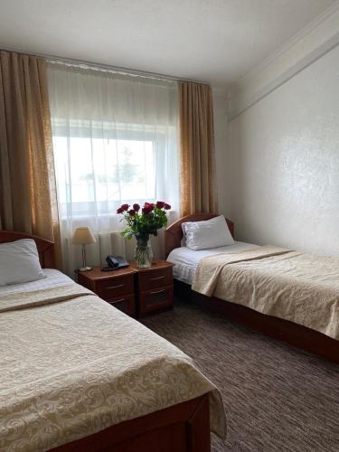 Katil atau katil-katil dalam bilik di Hotel Kopa - Zhovkva