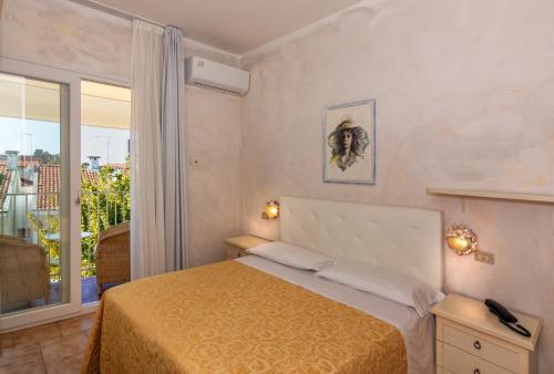Llit o llits en una habitació de Hotel Euromar