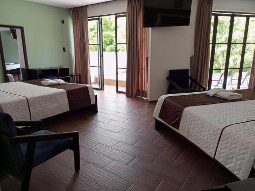 Ein Bett oder Betten in einem Zimmer der Unterkunft Terra Luna Lodge
