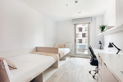 Postel nebo postele na pokoji v ubytování Soto House Pamplona