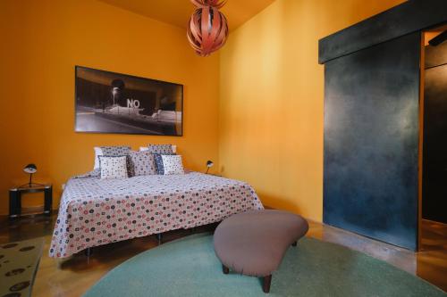 Tempat tidur dalam kamar di 3 Rooms 10 Corso Como Milano