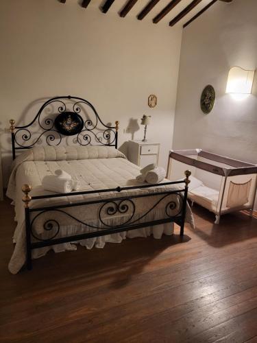 Ένα ή περισσότερα κρεβάτια σε δωμάτιο στο Agriturismo Poggiolo
