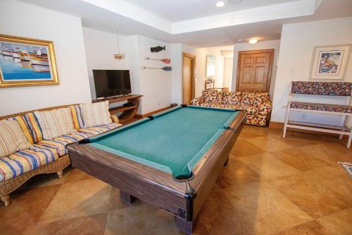 a living room with a pool table in it at OCEANFRONT, Private Pool, Rec Rm, Ocean Views! PI265, Mroning Star in Sanderling