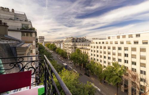 a view of a city street with buildings at Elysées Ceramic in Paris