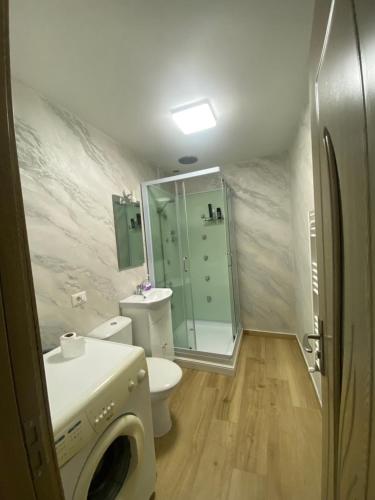 Et badeværelse på Apartament 2 camere