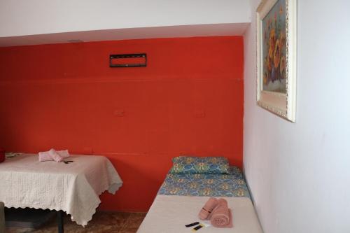 Lova arba lovos apgyvendinimo įstaigoje Hotel Caminito Iguazú Tango