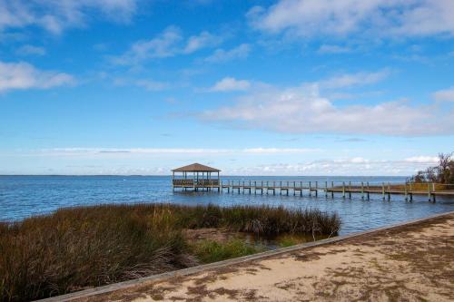 a pier with a gazebo on the water at Soundfront, Sound Views, Kayak! PT1402, Keene ll in Sanderling