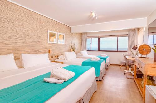 Ένα ή περισσότερα κρεβάτια σε δωμάτιο στο Hotel Gavina Costa Mar