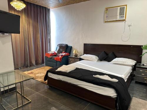 Postel nebo postele na pokoji v ubytování Nasheman & hotel