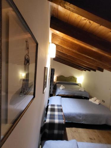 Ένα ή περισσότερα κρεβάτια σε δωμάτιο στο Agriturismo Poggiolo