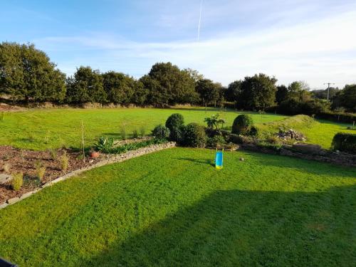 an aerial view of a field with a garden at La casa Tata in Taulé