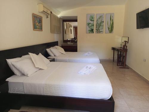 Ein Bett oder Betten in einem Zimmer der Unterkunft Terra Luna Lodge