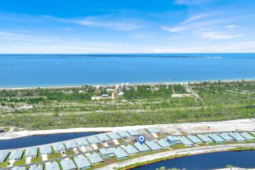an aerial view of the beach and the ocean at Joe's Beach House in Highland View