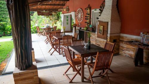 Hotel Chale Nosso Sítioにあるレストランまたは飲食店
