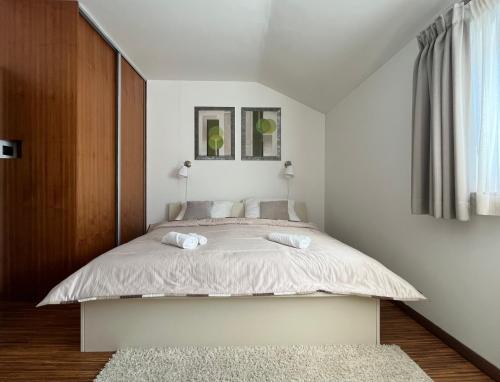 Postel nebo postele na pokoji v ubytování Apartmánový Dom 44