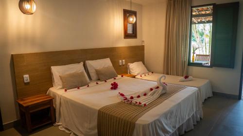 Hotel Chale Nosso Sítioにあるベッド